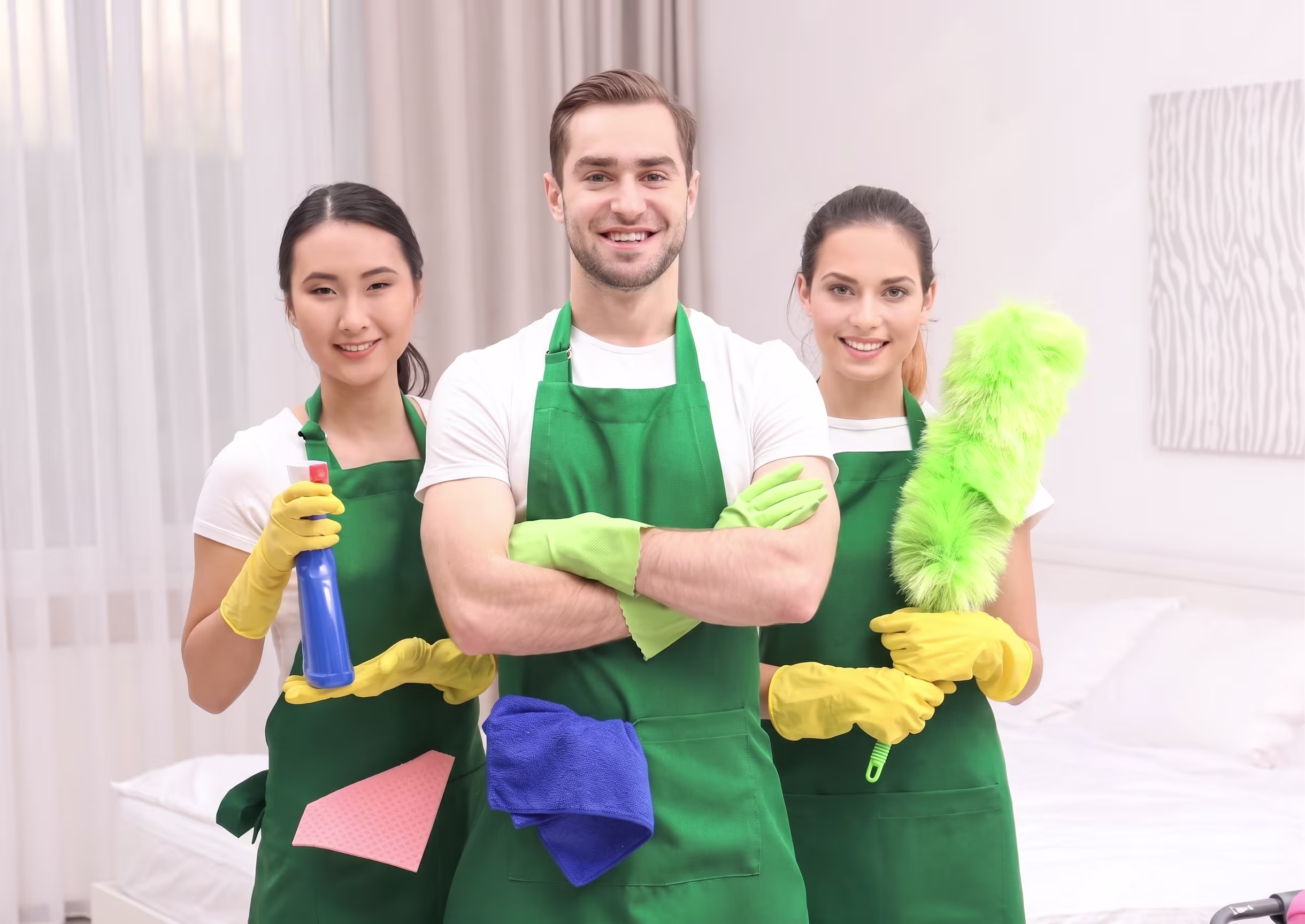 Cleanerway friendly professional cleaners smiling in aprons ready for service in Melbourne